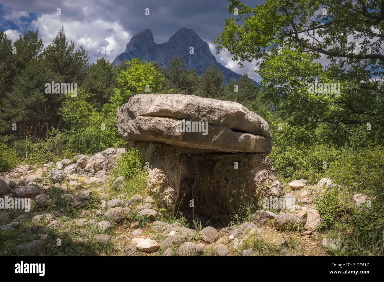 Dolmen of Molers with the Pedraforca Massif on the Background, Catalonia Stock Photo