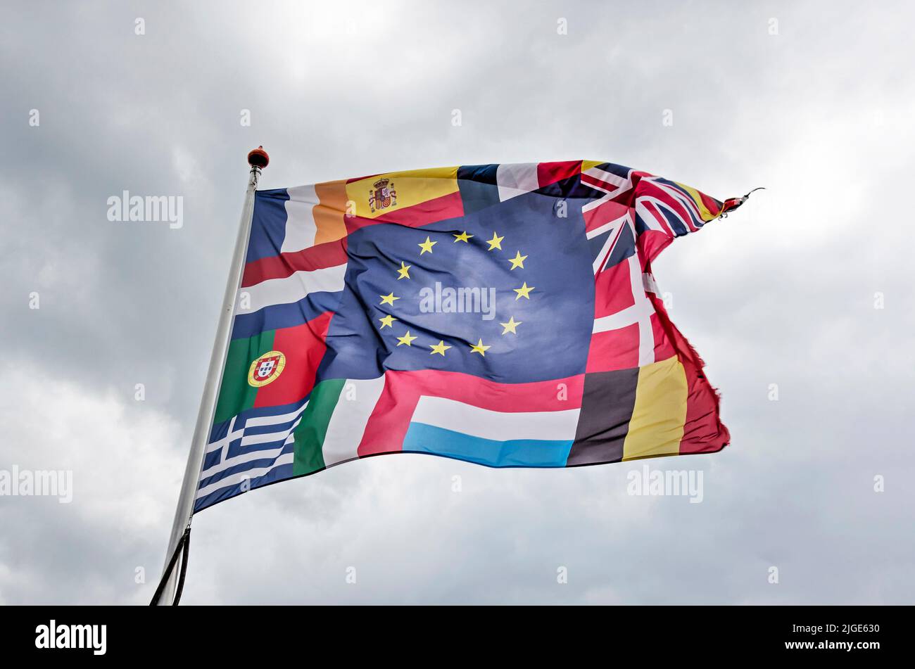 Numansdorp, The Netherlands, July 3, 2022: large flag with yellow-blue flag of the European Union as well as flags of several other countries includin Stock Photo
