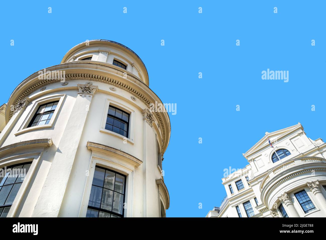 Generic London architecture against blue sky background with space for text. Stock Photo