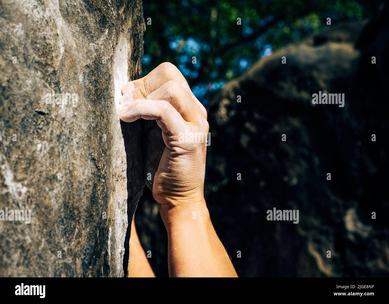Bouldering hand crimping Stock Photo Alamy