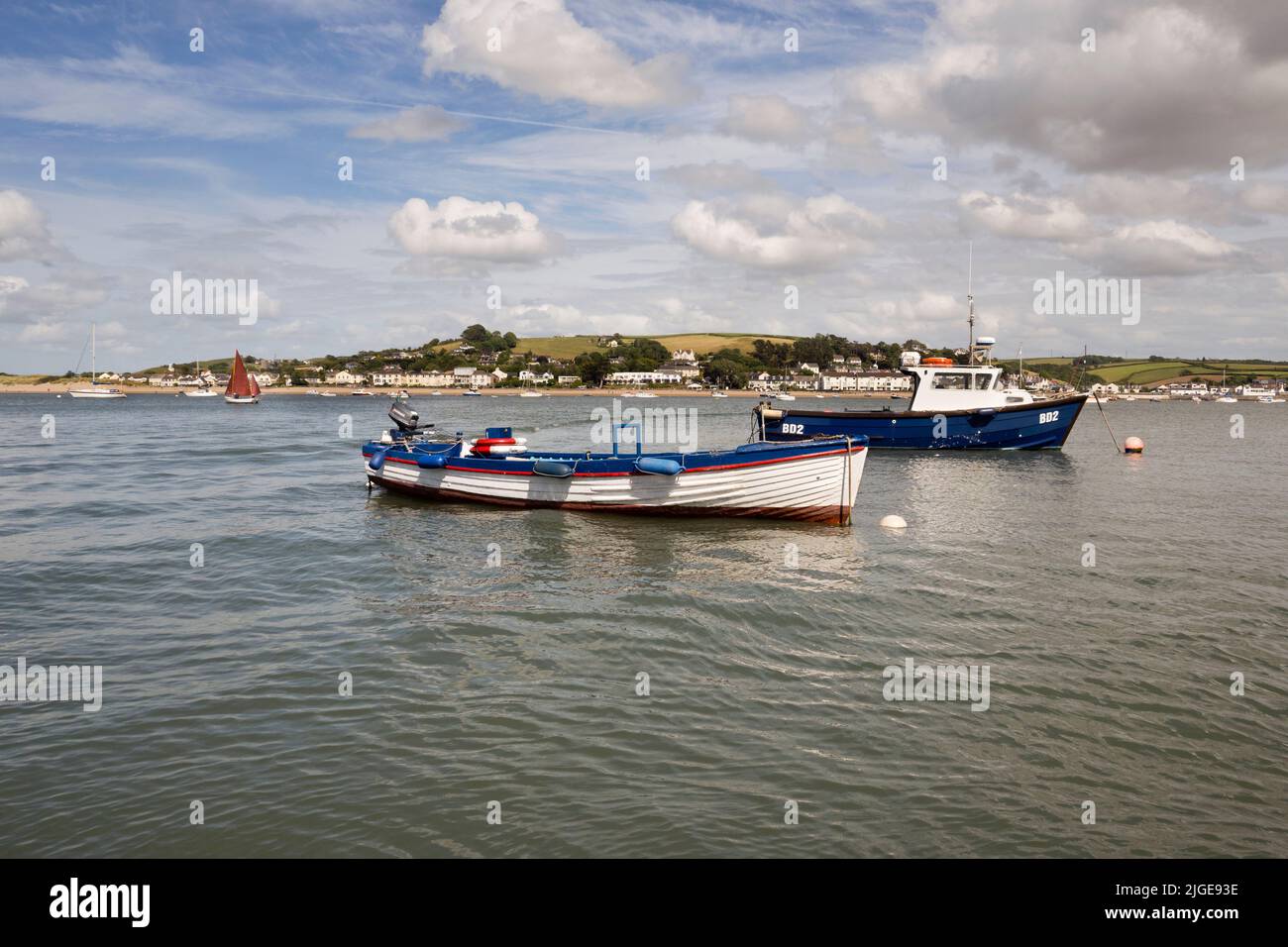 Boats moored at Appledore, with view across the bay to Instow, Devon, UK Stock Photo