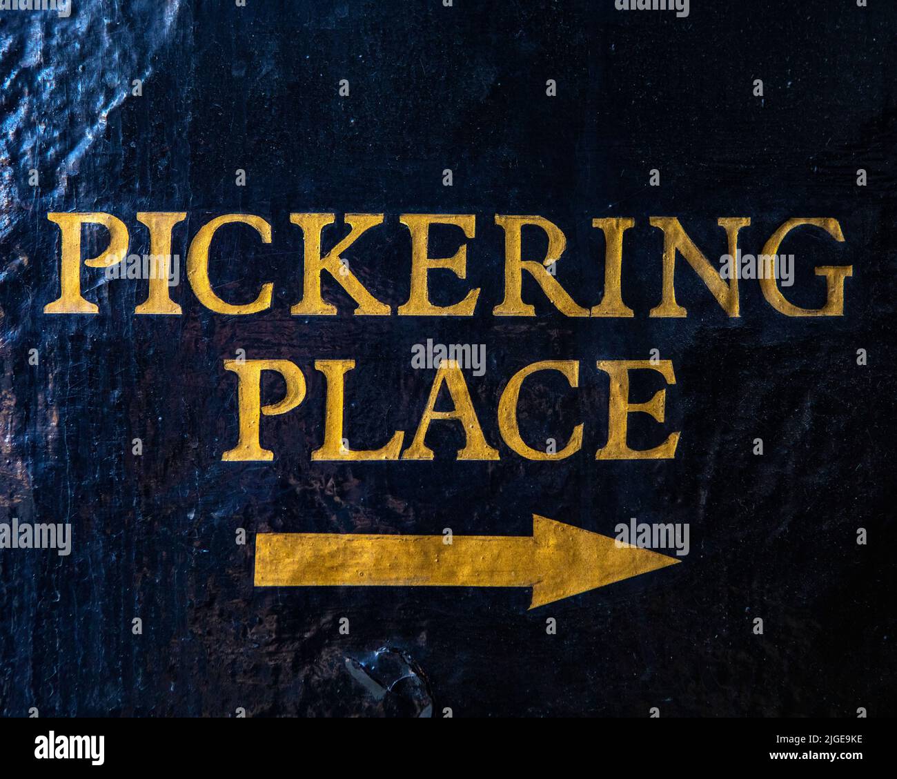 A direction sign for Pickering Place in London, UK - known for being the smallest square in London. Stock Photo