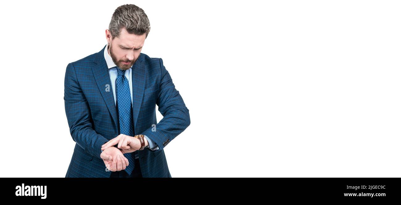 Businessman in business suit place fingers on wrist measuring heartbeat with watch, pulse rate. Man face portrait, banner with copy space. Stock Photo