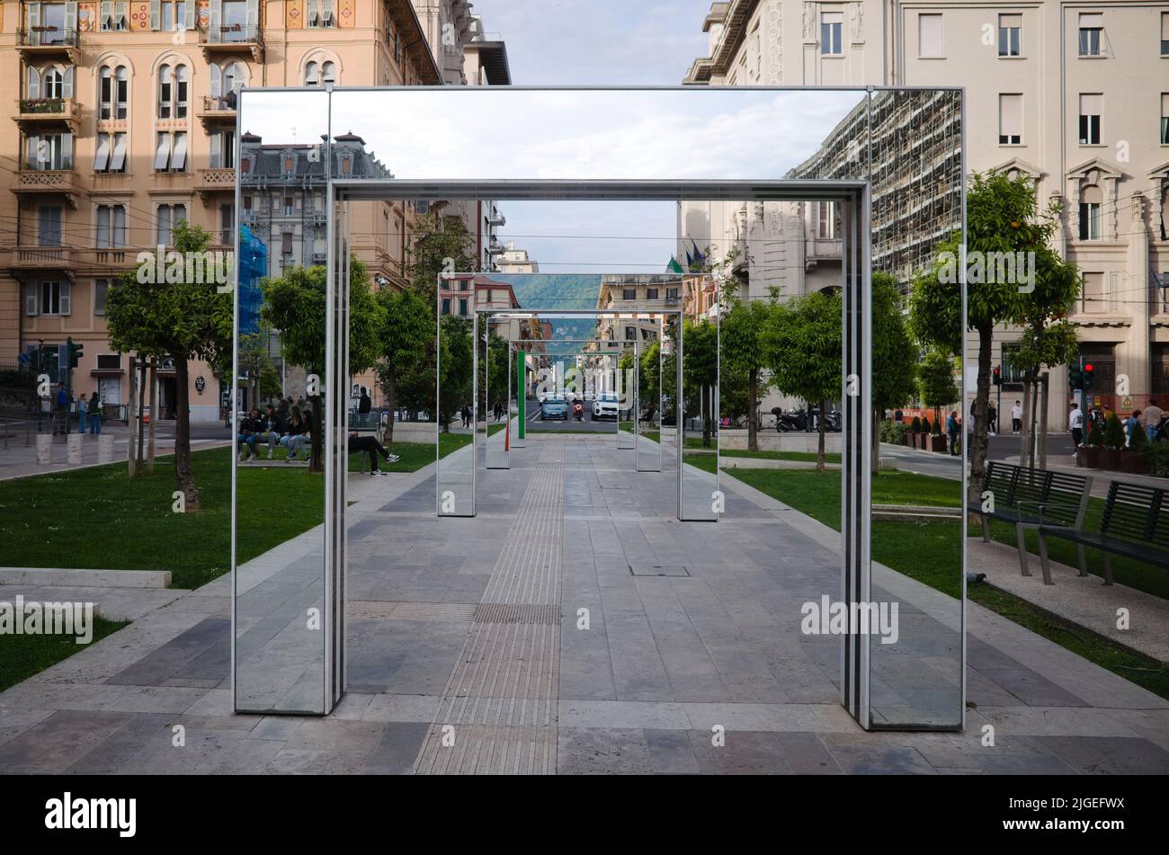 La Spezia, Italy - April, 2022: Modern installation of mirrored arches along Piazza Giuseppe Verdi street. Contemporary art in infrastructure of city. Stock Photo