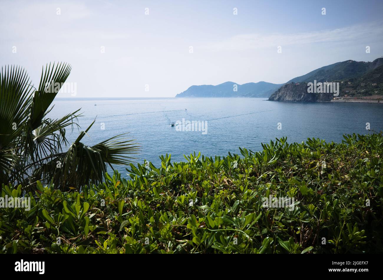 Panoramic view of Mediterranean coastline and Ligurian coast in Cinque Terre National Park, Liguria, Italy. Seascape of Italian Riviera near Manarola Stock Photo