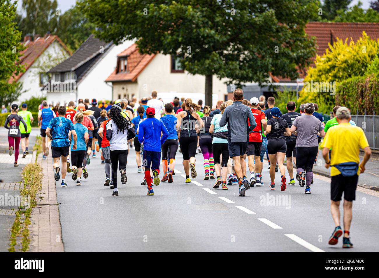 Bruchhausen Vilsen, Germany. 10th July, 2022. Runners start in the 'Man against Machine' race in the Diepholz district. The running course runs mainly parallel to a running steam train of the museum railroad. Credit: Moritz Frankenberg/dpa/Alamy Live News Stock Photo