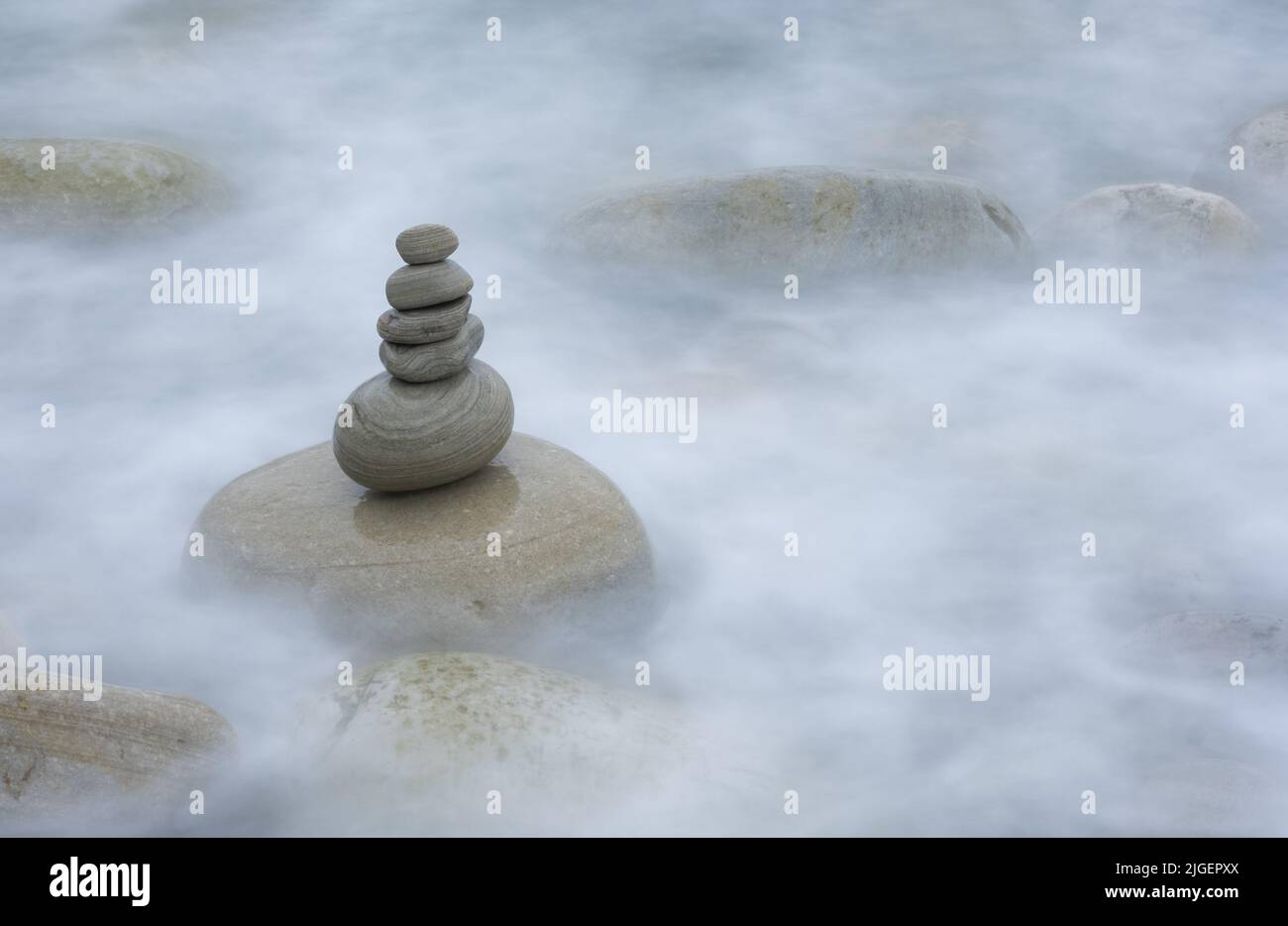 Pile of stones next to water hi-res stock photography and images - Alamy