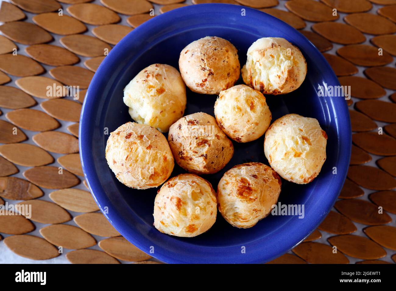 many delicious cheese breads on plate and coffee table - typical food from Minas Gerais - Cafe Mineiro Stock Photo