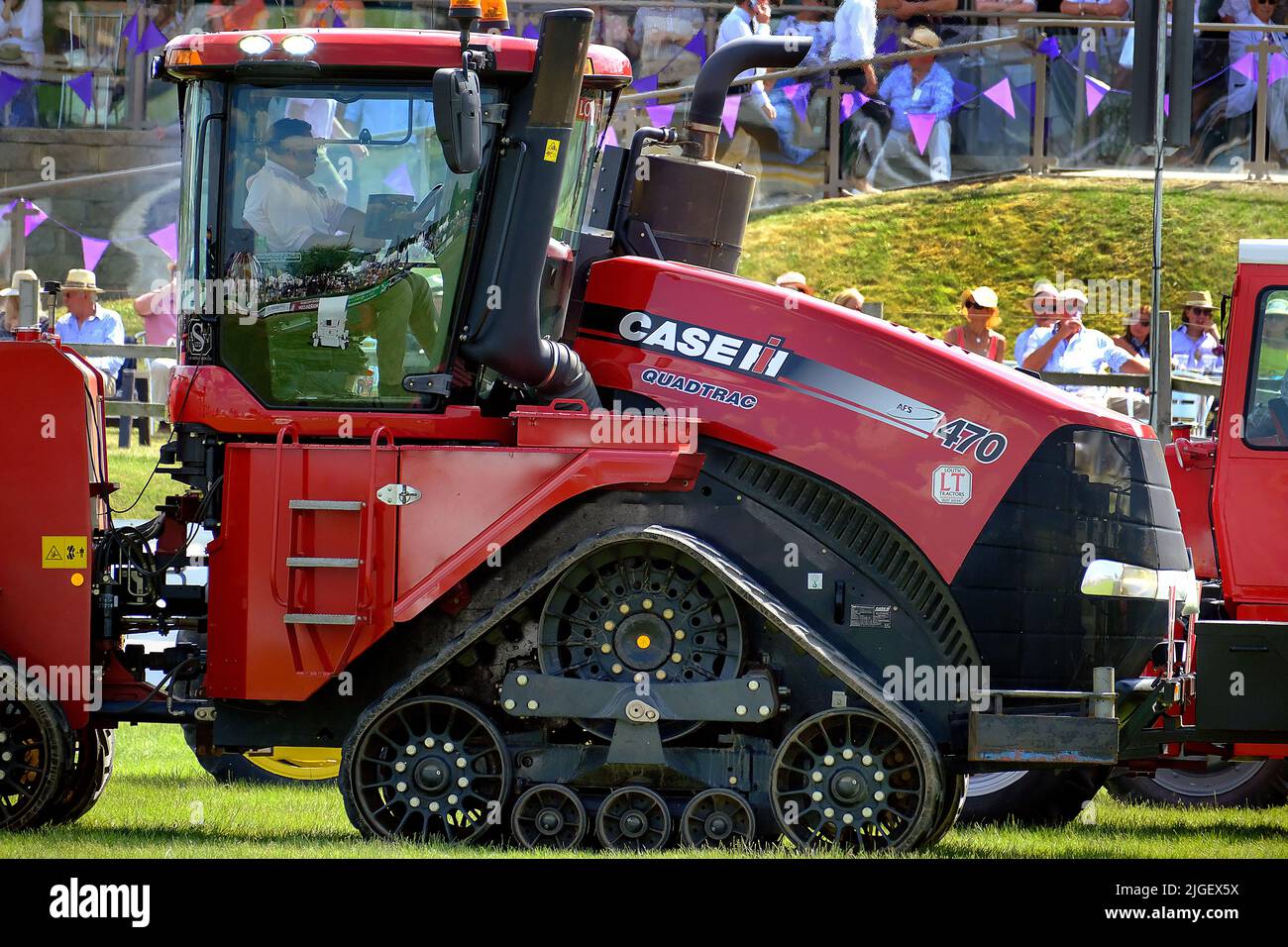 Tractors and implements on display at an agricultural show. Stock Photo