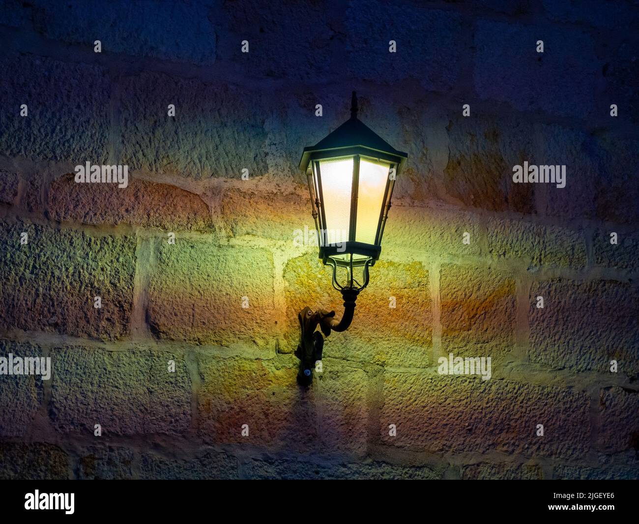 aged street lighting lamp in Germany. Image in old color style Stock