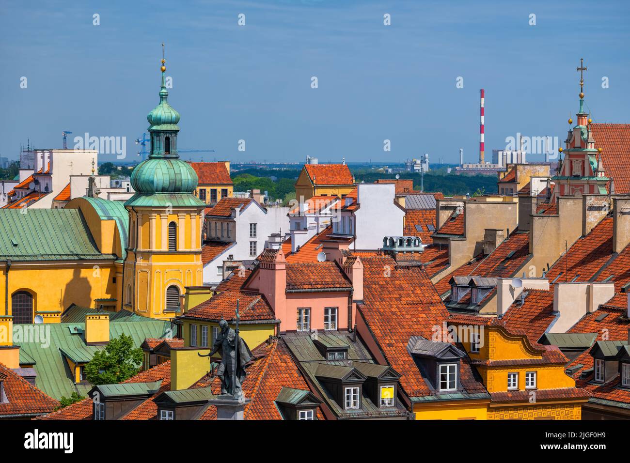 City of Warsaw in Poland, view over the rooftops of historic tenement houses in the Old Town. Stock Photo