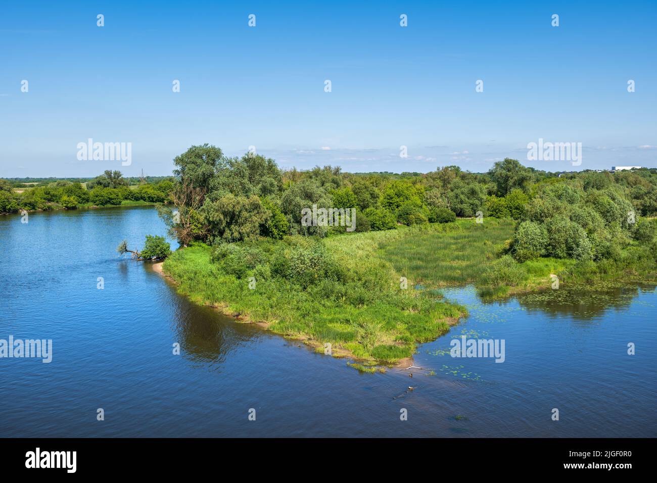 River Narew scenic landscape of blue and green, Masovian Voivodeship in Poland. Stock Photo