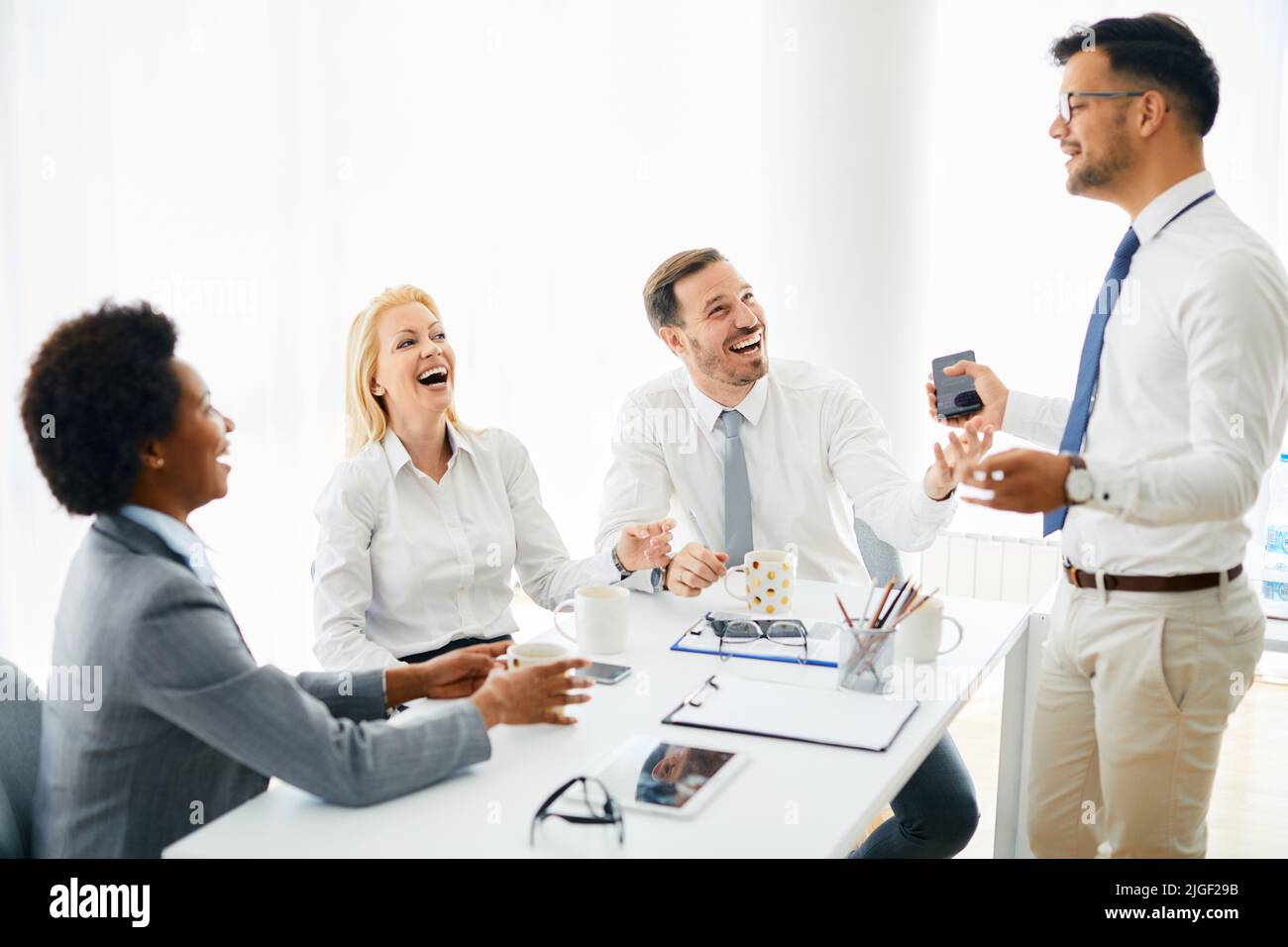 young business people meeting office teamwork group success corporatye discussion Stock Photo