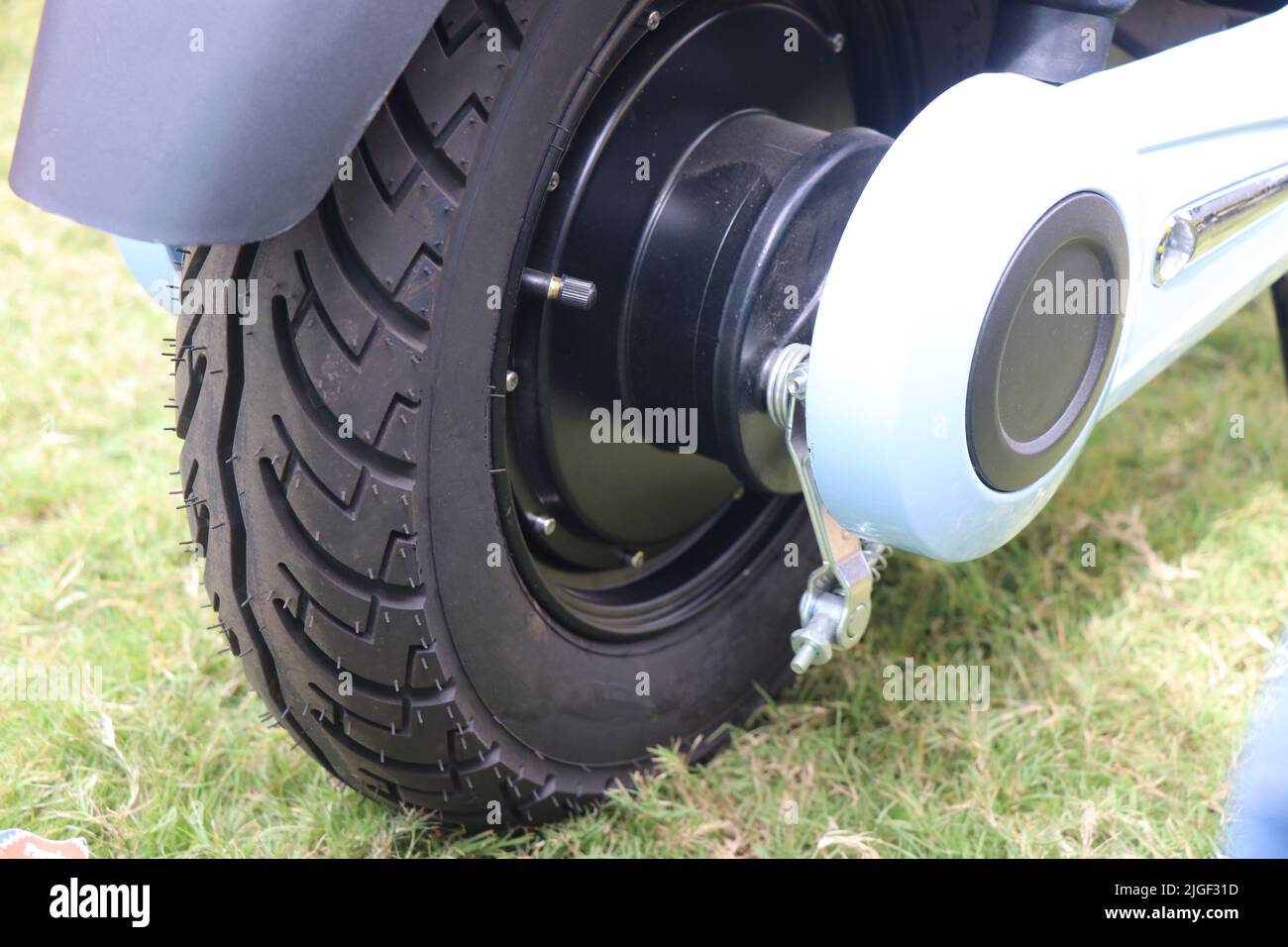 Electric scooter rear wheel with hub dc motor and breaks. Future clean transport vehicles