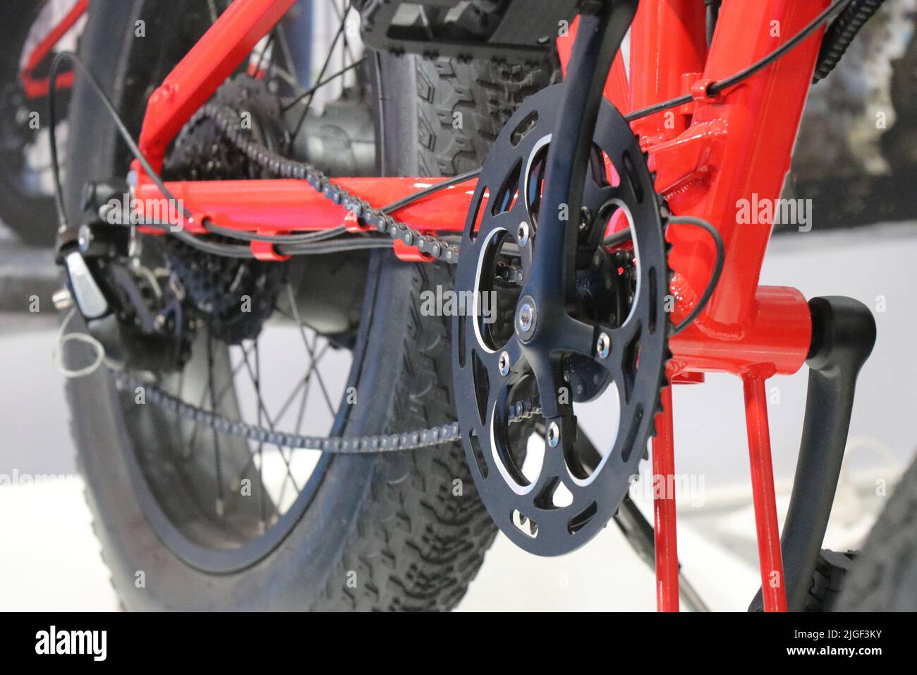 Chain of an hybrid electric bicycle dislocated from its main hub that needs to be fixed Stock Photo