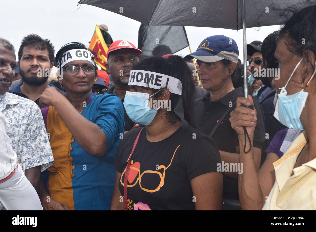 Colombo, Sri Lanka. 7th July 2022. Thousands of protesters stormed the Sri Lankan president's official residence, president's secretariat, prime minister's official residence and set fire to the prime minister's private residence as anger intensified over the country's worst economic crisis in seven decades. People from all over the country gathered at the Galle Face green in protest which went on into the night. Stock Photo