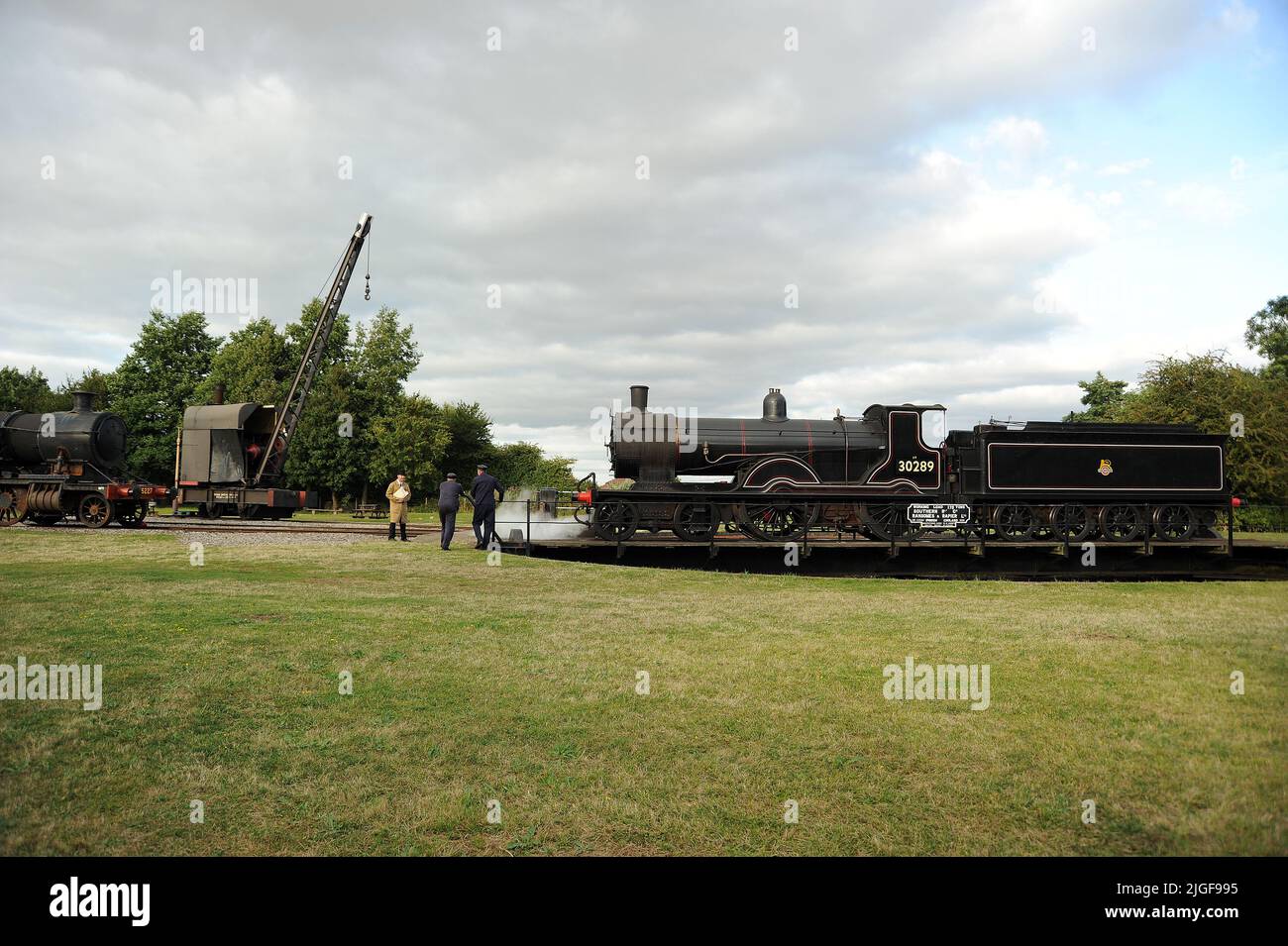 MPD staff with '30120' (running as '30289') at Didcot's turntable. Stock Photo