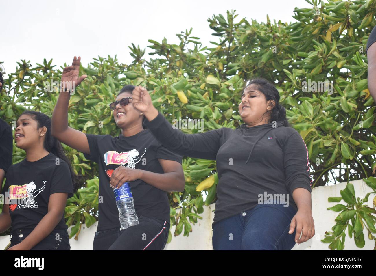 Colombo, Sri Lanka. 7th July 2022. Thousands of protesters stormed the Sri Lankan president's official residence, president's secretariat, prime minister's official residence and set fire to the prime minister's private residence as anger intensified over the country's worst economic crisis in seven decades. People from all over the country gathered at the Galle Face green in protest which went on into the night. Stock Photo