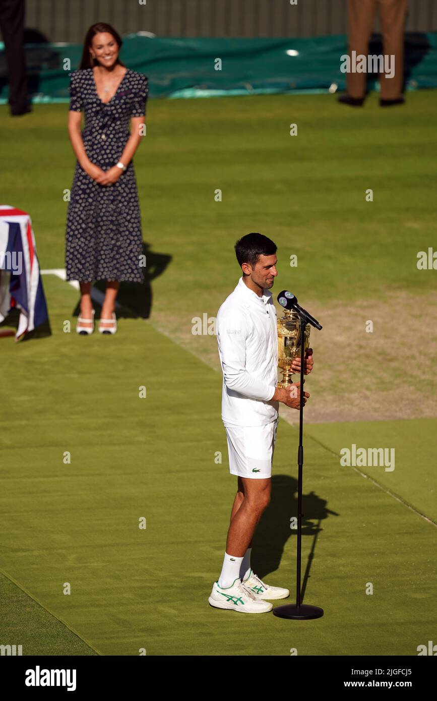 Novak Djokovic after being presented with the Trophy by The Duchess of Cambridge on day fourteen