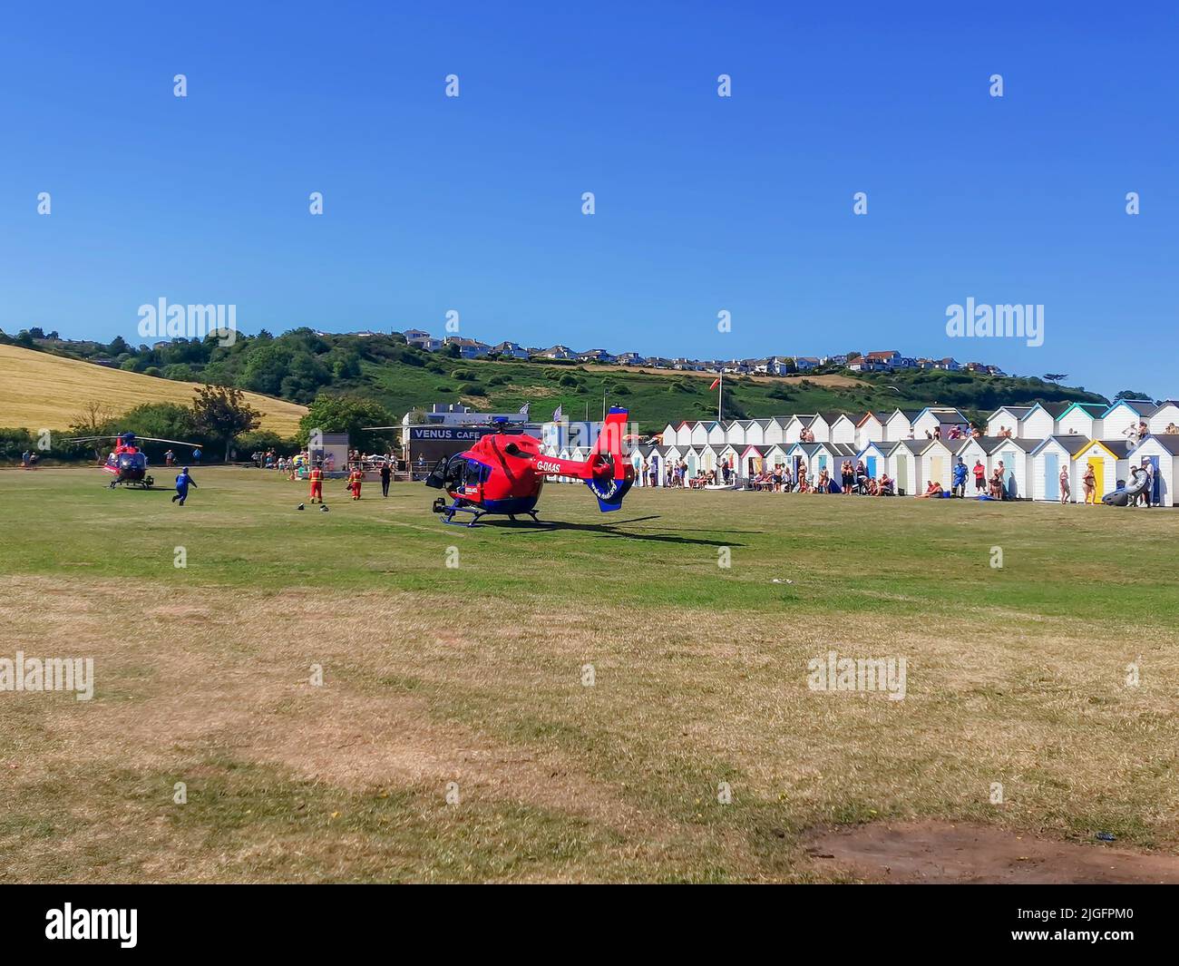Paignton, UK. Sunday 10 July 2022. Two Air Ambulance attend incident at Broadsands Beach, Paignton, Devon, UK Credit: Thomas Faull/Alamy Live News Stock Photo