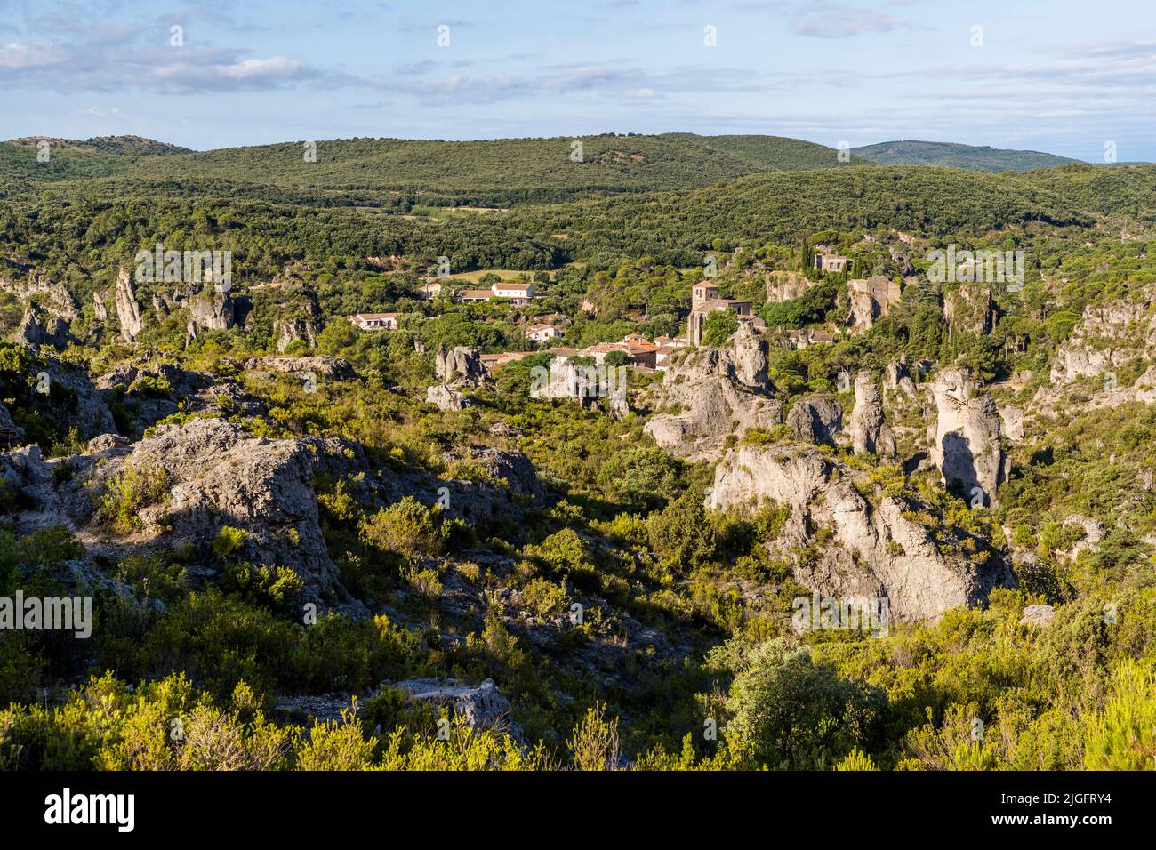At the edge of the village od Mourèze (Lodève, France) is a spectacular dolomitic limestone outcrop known as the Cirque de Mourèze Stock Photo