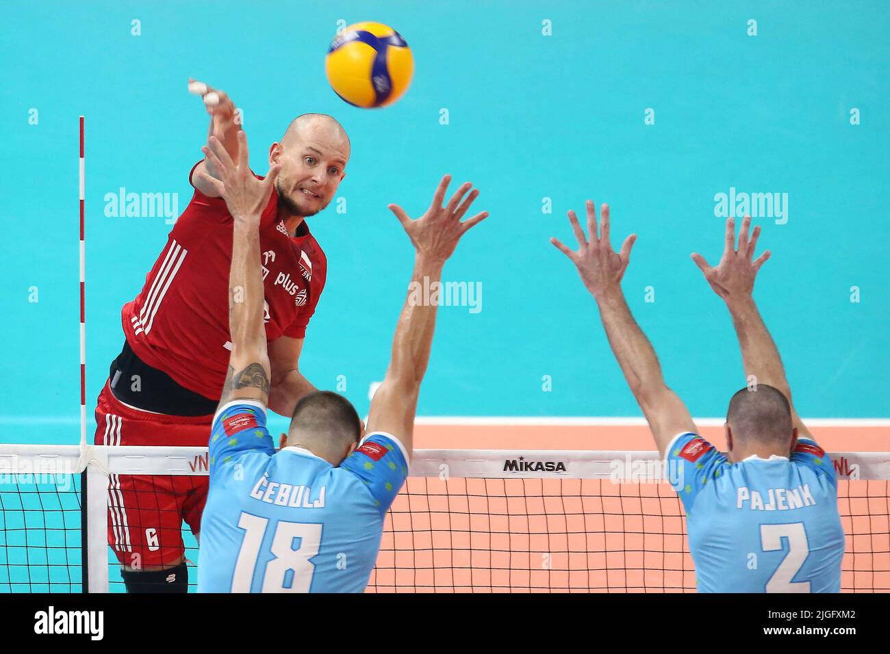 Gdansk, Poland. 10th July, 2022. Bartosz Kurek (L) of Poland and Tine Urnaut (C) and Alen Pajenk (R) of Slovenia during the 2022 men's FIVB Volleyball Nations League match between Poland and Slovenia in Gdansk, Poland, 10 July 2022. Credit: PAP/Alamy Live News Stock Photo