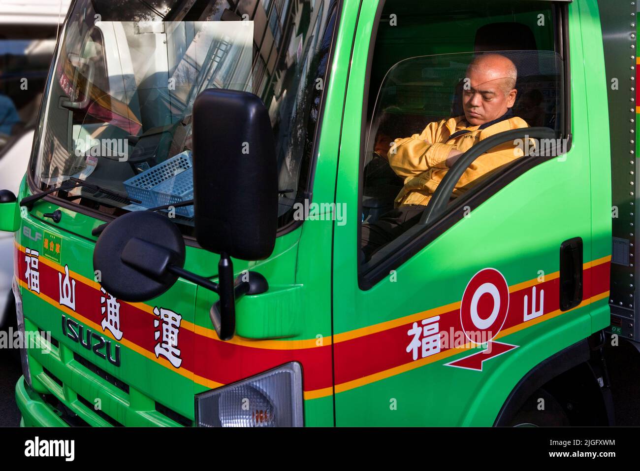 Delivery truck driver naps Tokyo Japan Stock Photo Alamy