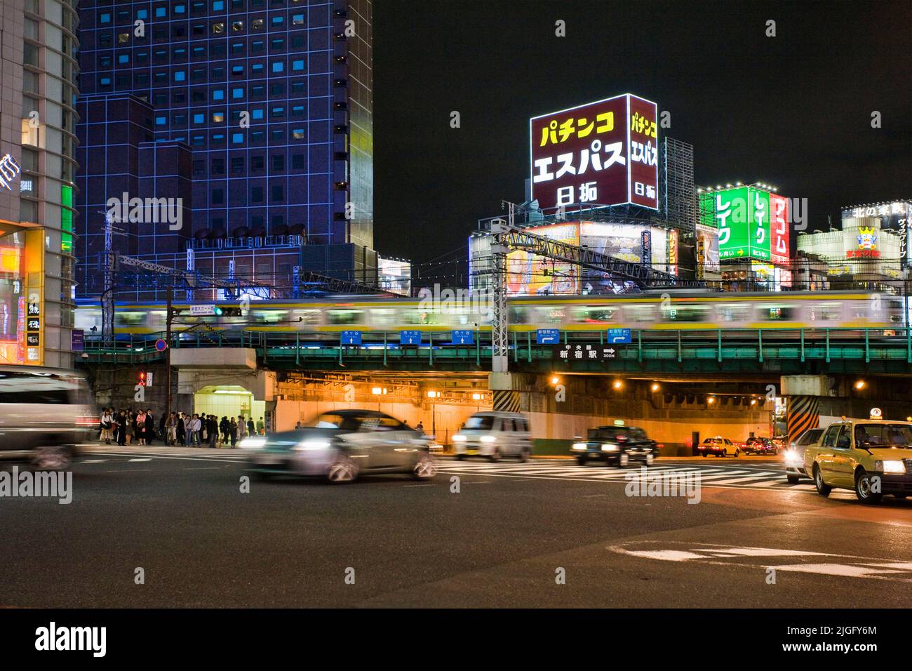 Evening traffic train Shinjuku Tokyo Japan Stock Photo