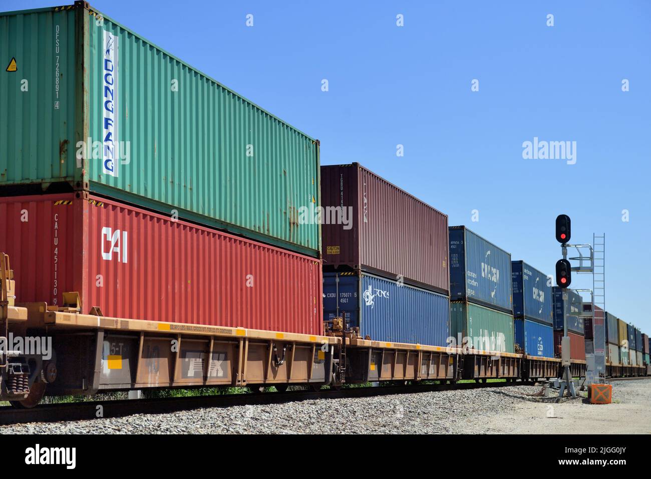 Dundee, Illinois, USA. A Canadian National Railway intermodal freight train through a passing siding in a rural section of northeastern Illinois. Stock Photo