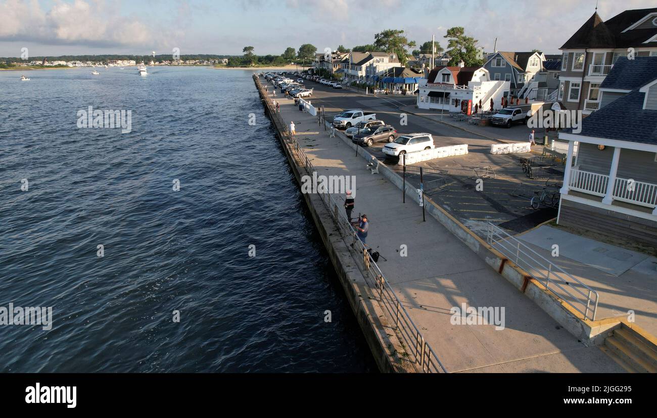 Fisherman along the pier in Manasquan, NJ Stock Photo - Alamy what fish are biting in new jersey