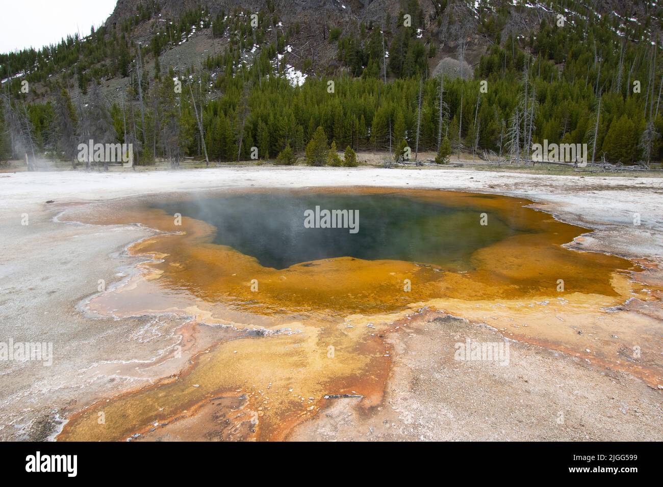 The Emerald Pool at Black Sand Basin in Yellowstone NP, WY, USA.  May Stock Photo