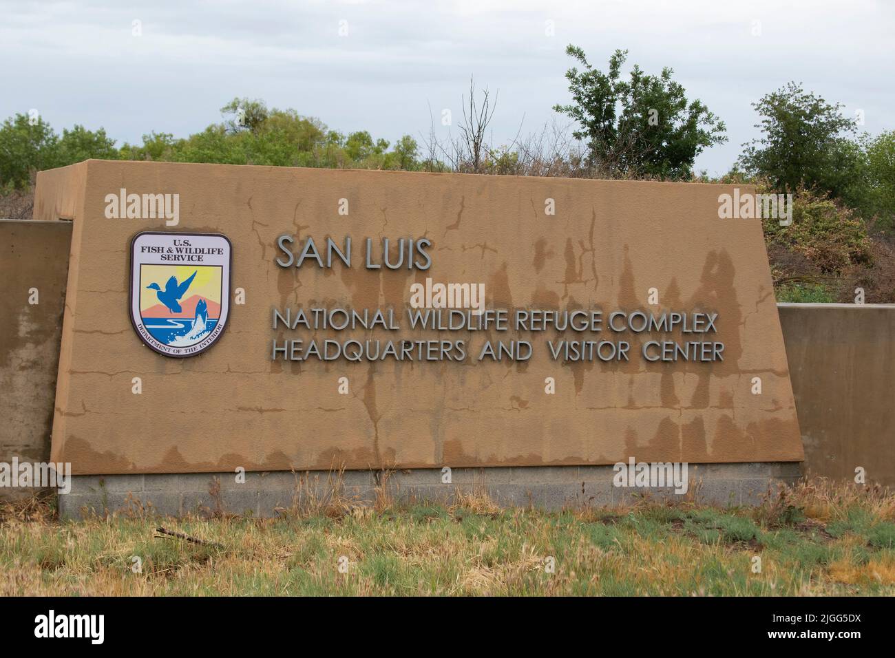 Official entrance sign to the San Luis NWR Complex Visitor Center in Merced County, 8 miles north of Los Banos, CA. USA Stock Photo