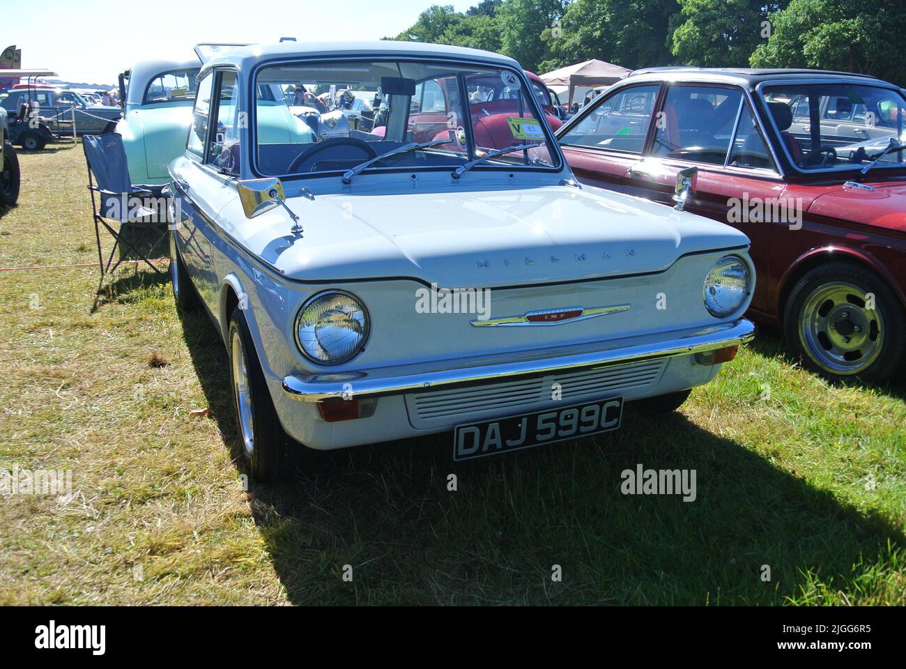 A 1965 Hillman Imp car parked on display at the 47th Historic Vehicle Gathering classic car show, Powderham, Devon, England, UK. Stock Photo