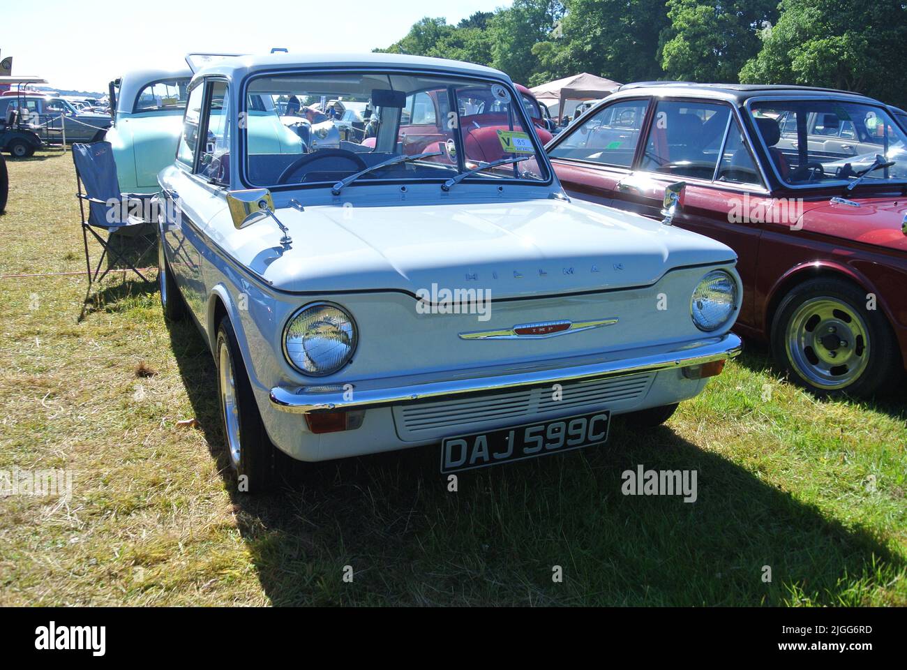 A 1965 Hillman Imp car parked on display at the 47th Historic Vehicle Gathering classic car show, Powderham, Devon, England, UK. Stock Photo