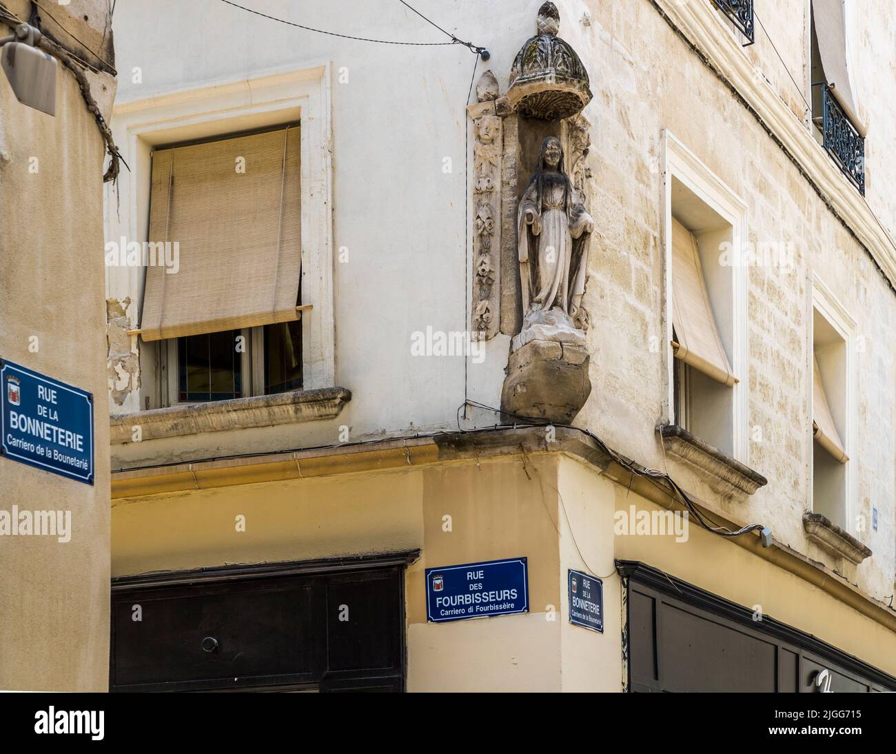 Typical for Avignon are the Madonna figures on many house facades. Avignon, France Stock Photo