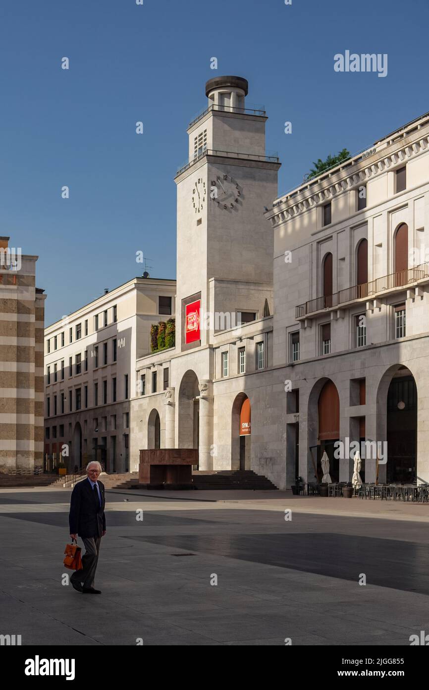 Old man in suit and tie in piazza Vittoria, Brescia, Lombardia, Italy Stock Photo