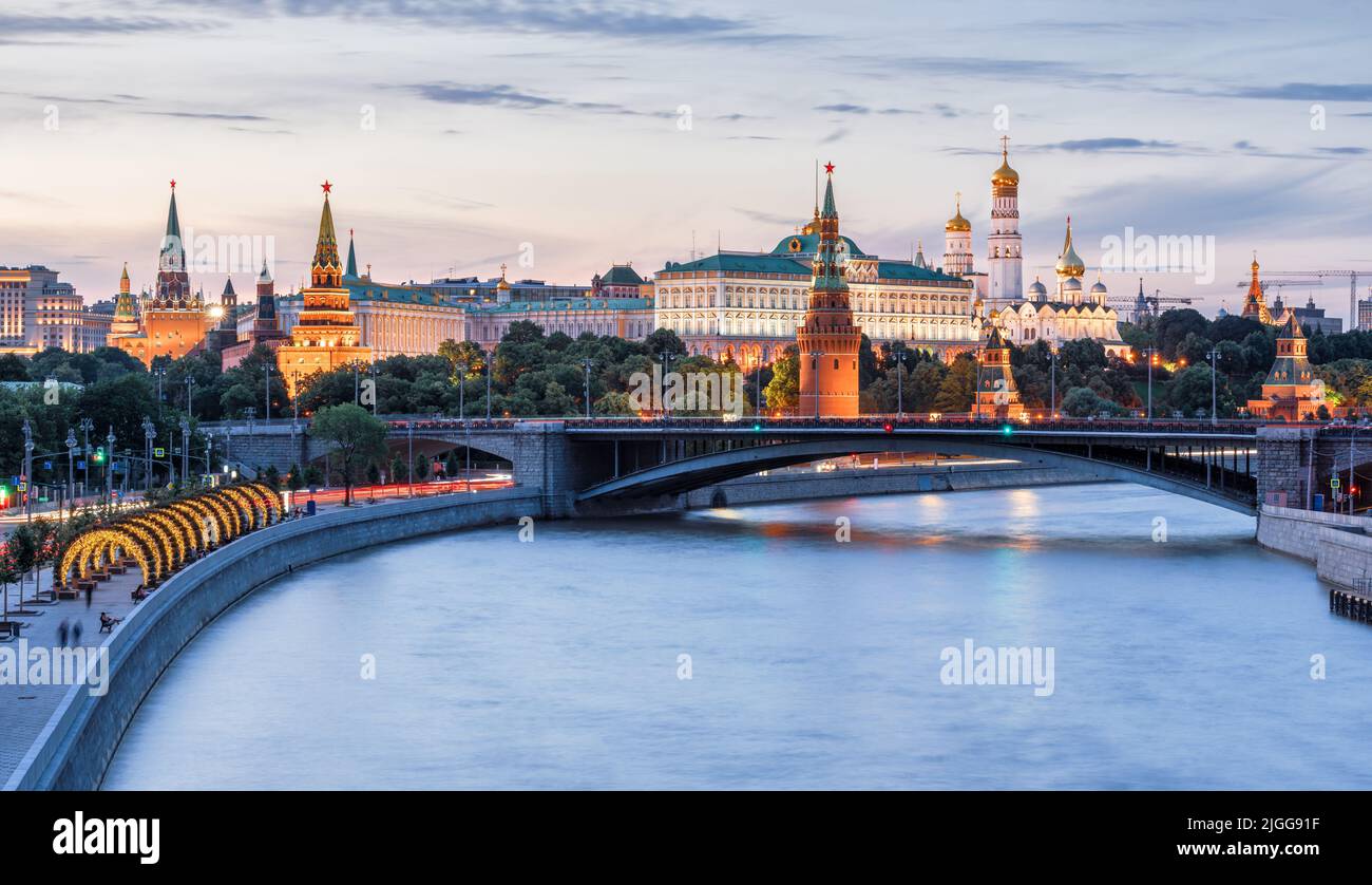 Moscow Kremlin at Moskva River, Russia. Scenery of Moscow city center at sunset. Beautiful Moscow cityscape at blue dusk, nice landscape of Russian ca Stock Photo