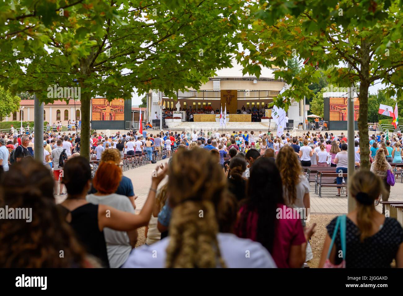 Gathered pilgrims praying during Mladifest 2021 – the youth festival – in Medjugorje. Stock Photo