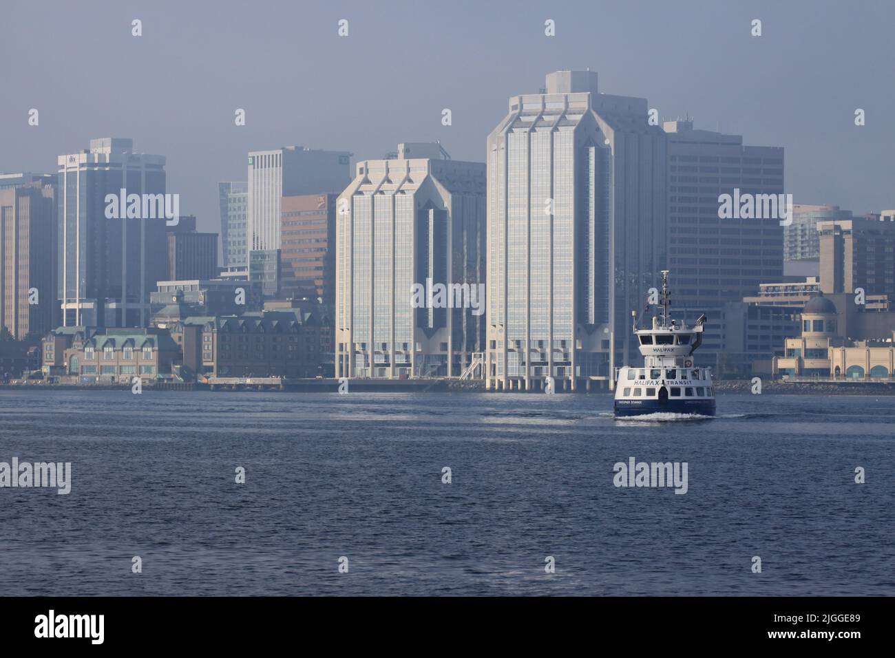 Halifax harbour during summer with ferries and war ships Stock Photo