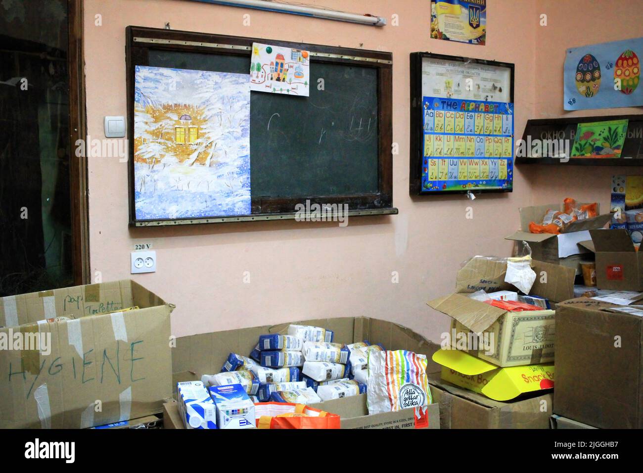 Odessa, Ukraine. 24th May, 2022. Humanitarian aid is seen visible in classroom. Previously, the building was used for extracurricular education of children in creativity and biology. Since the beginning of the war between Russia and Ukraine, a volunteer center has been operating in these premises, dealing with the distribution of humanitarian aid from EU. (Photo by Viacheslav Onyshchenko/SOPA Images/Sipa USA) Credit: Sipa USA/Alamy Live News Stock Photo