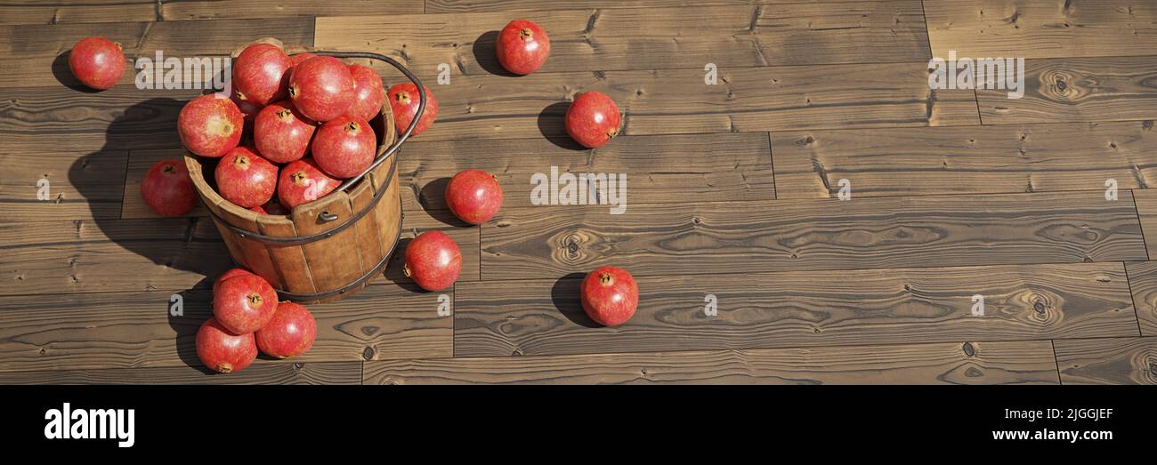 pomegranates, juicy fruits in a wooden crate on wooden background banner, 3d render Stock Photo