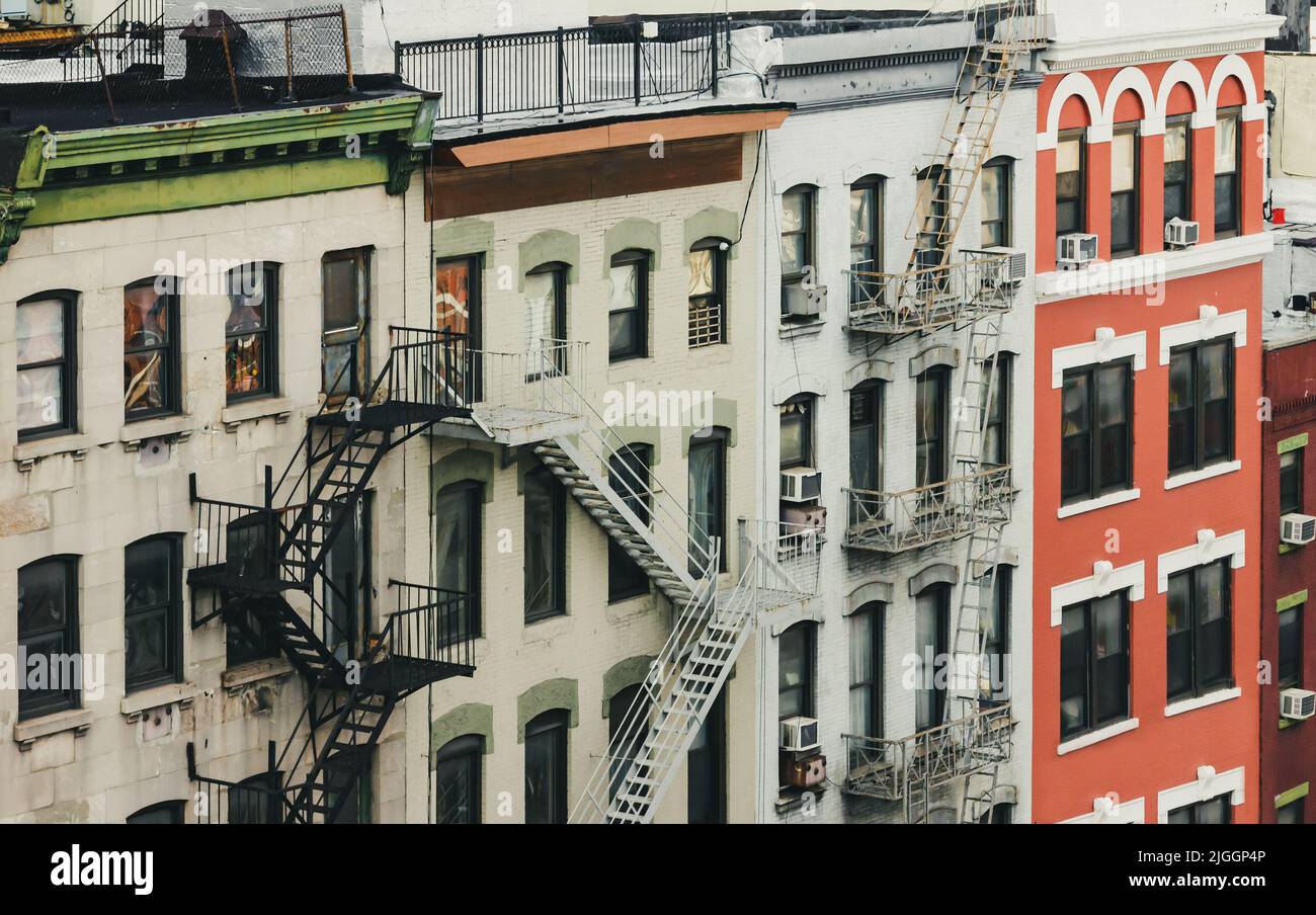 Old apartment buildings along Bowery street in Manhattan, New York City NYC Stock Photo