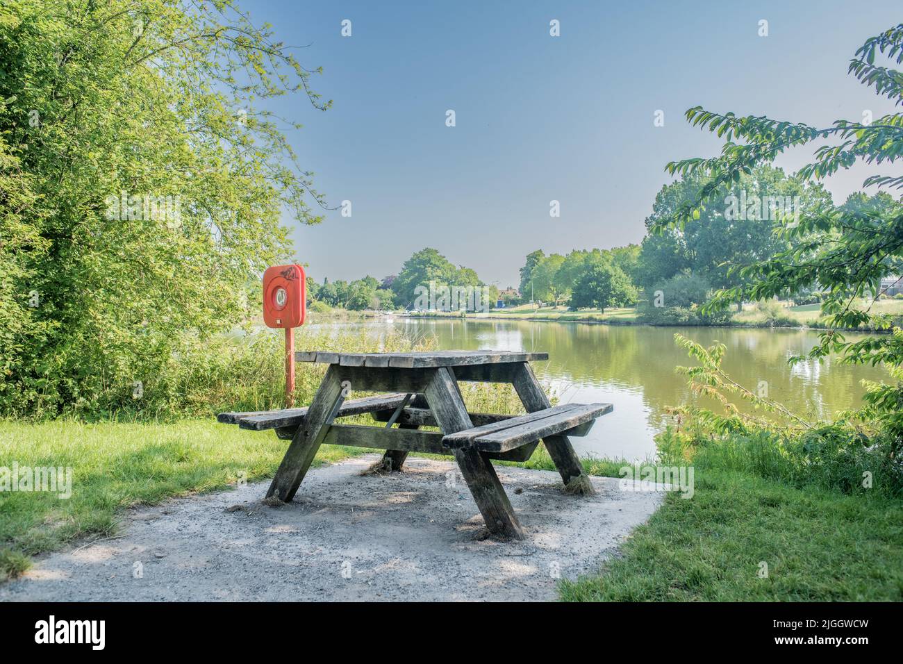 Nantwich Mill Island bench and life ring sunny day landscape, Cheshire. Stock Photo