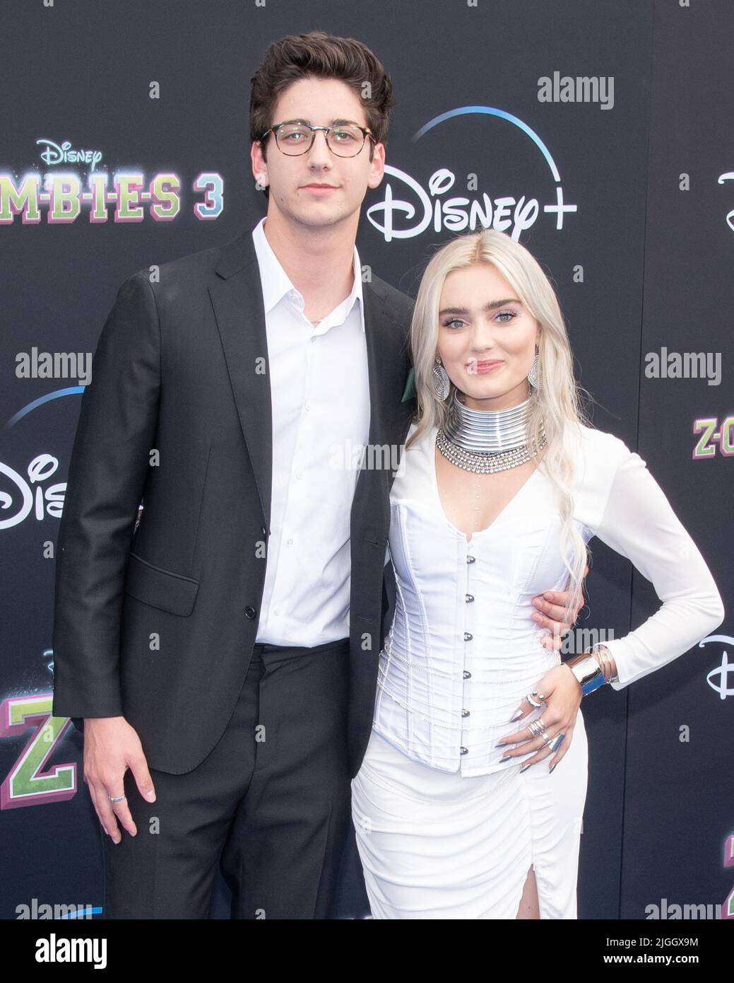 Santa Monica, USA. 09th July, 2022. Peyton Lee and Milo Manheim walking on  the red carpet at the Disney Zombies 3 Los Angeles premiere at Barker  Hangar in Santa Monica, CA on