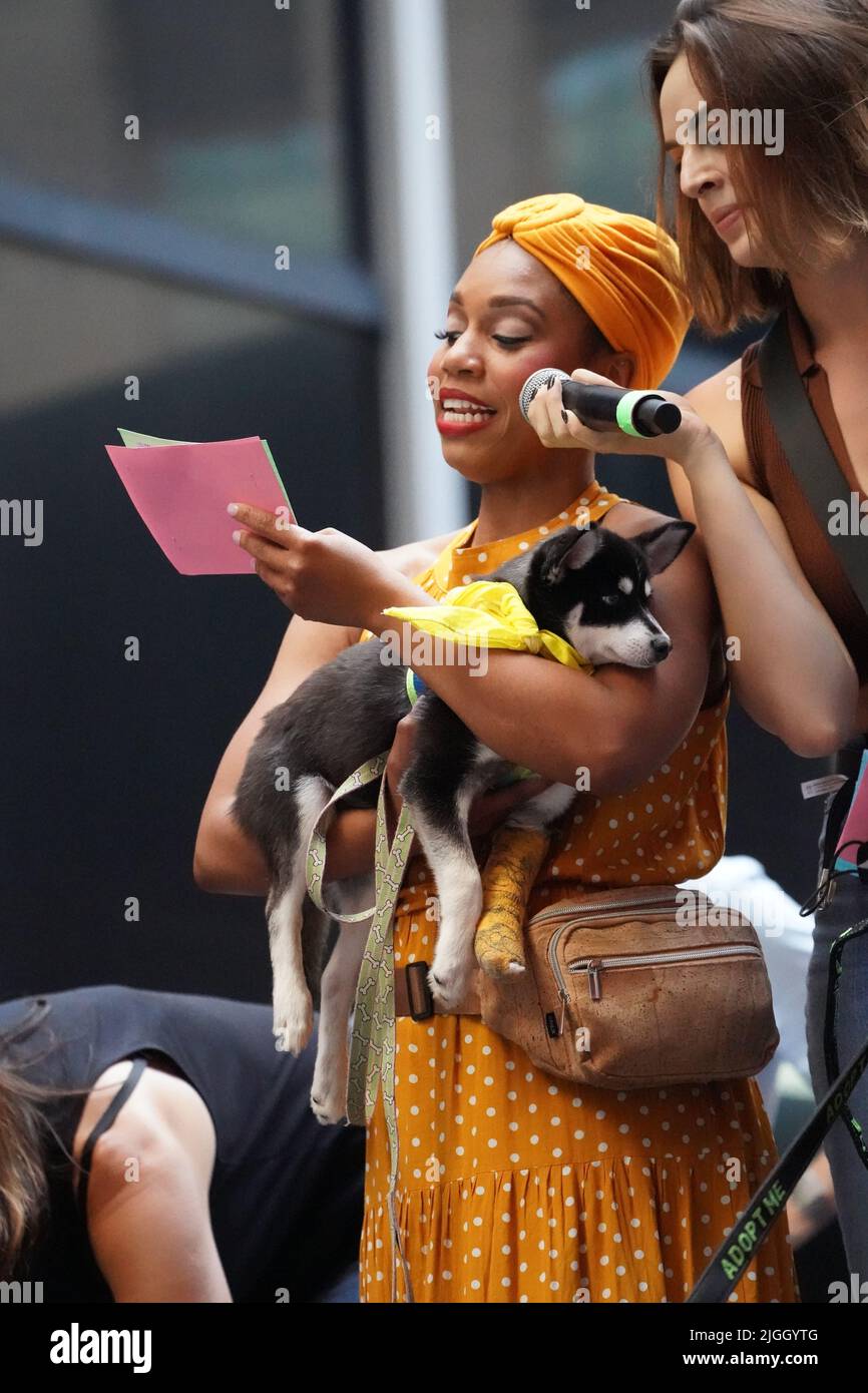 New York, United States. 08th July, 2022. Brittany Johnson and Talia Suskauer (from the musical Wicked) show a puppy for adoption at the Annual Broadway Barks Pet adoption event hosted by Bernadette Peters in Shubert Alley, New York. (Photo by Catherine Nance/SOPA Images/Sipa USA) Credit: Sipa USA/Alamy Live News Stock Photo