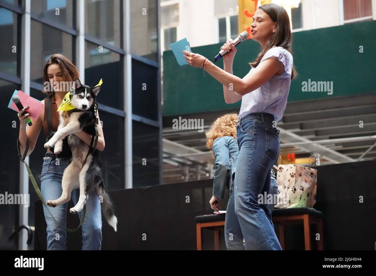 New York, United States. 08th July, 2022. Sutton Foster introduces Talia Suskauer( from Wicked) to show a Huskie puppy for adoption at the Annual Broadway Barks Pet adoption event hosted by Bernadette Peters in Shubert Alley, New York. (Photo by Catherine Nance/SOPA Images/Sipa USA) Credit: Sipa USA/Alamy Live News Stock Photo
