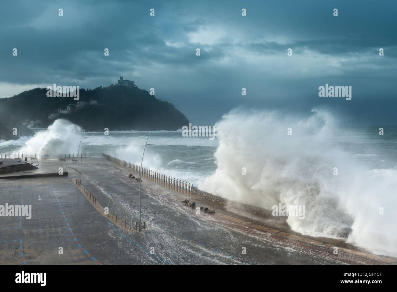 Waves breaking on New Promenade of Donostia-San Sebastian, Spain Stock Photo