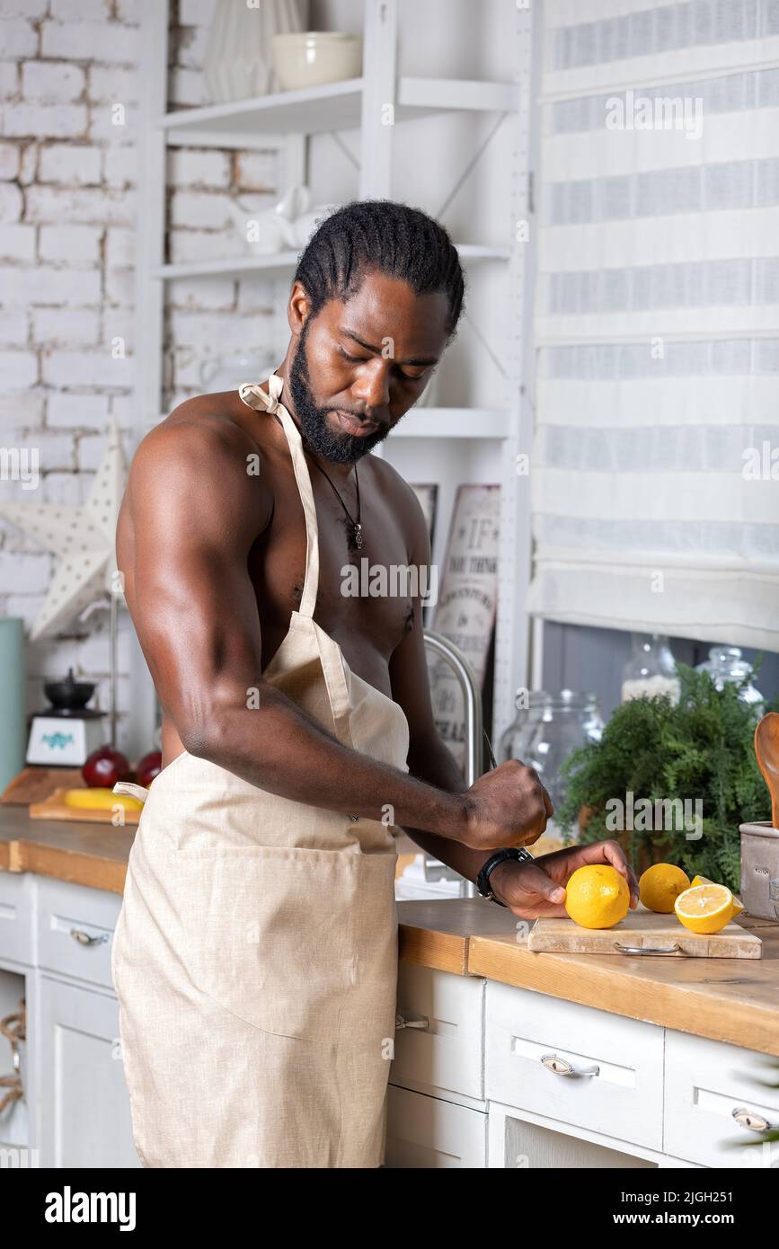 Man wearing an apron hi-res stock photography and images - Alamy