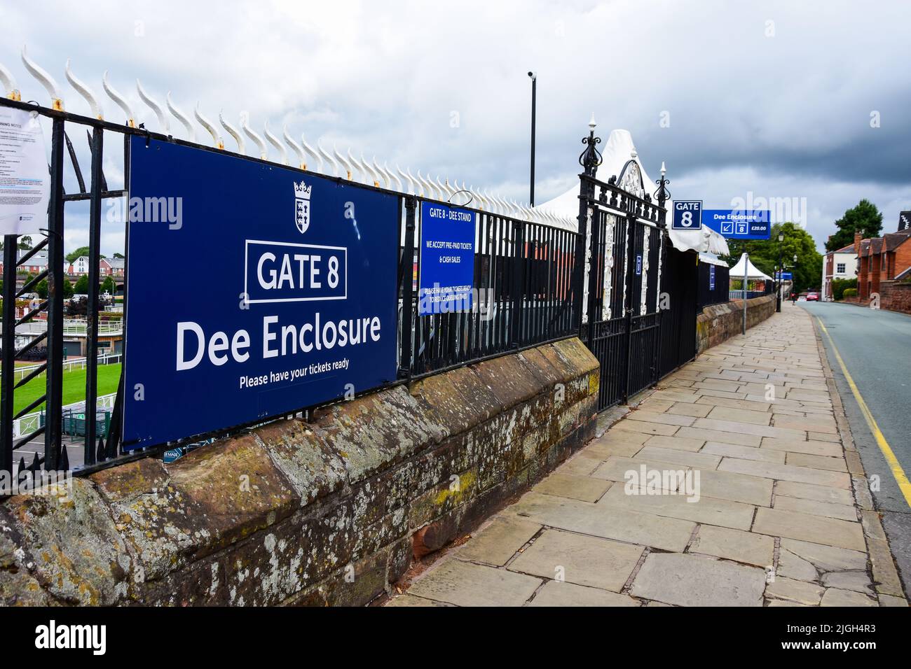Chester, UK: Jul 3, 2022: A sign marks the entrance to the Dee Enclosure and Dee Stand at Chester Racecourse. This is an uncovered viewing area. Stock Photo