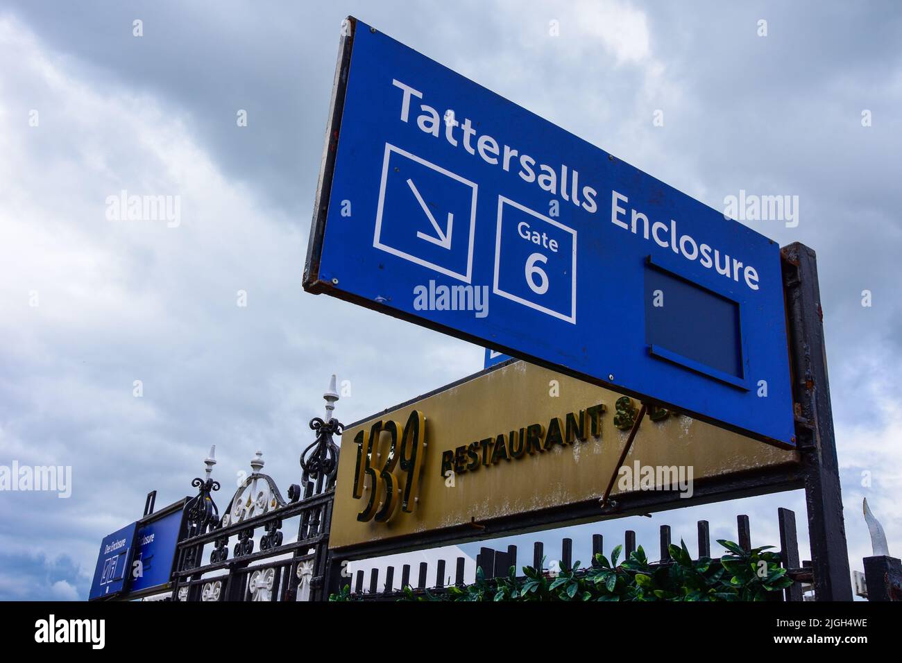 Chester, UK: Jul 3, 2022: A sign marks the entrance to the Tattersalls Enclosure and 1539 Restaurant at Chester Racecourse. This is the largest enclos Stock Photo
